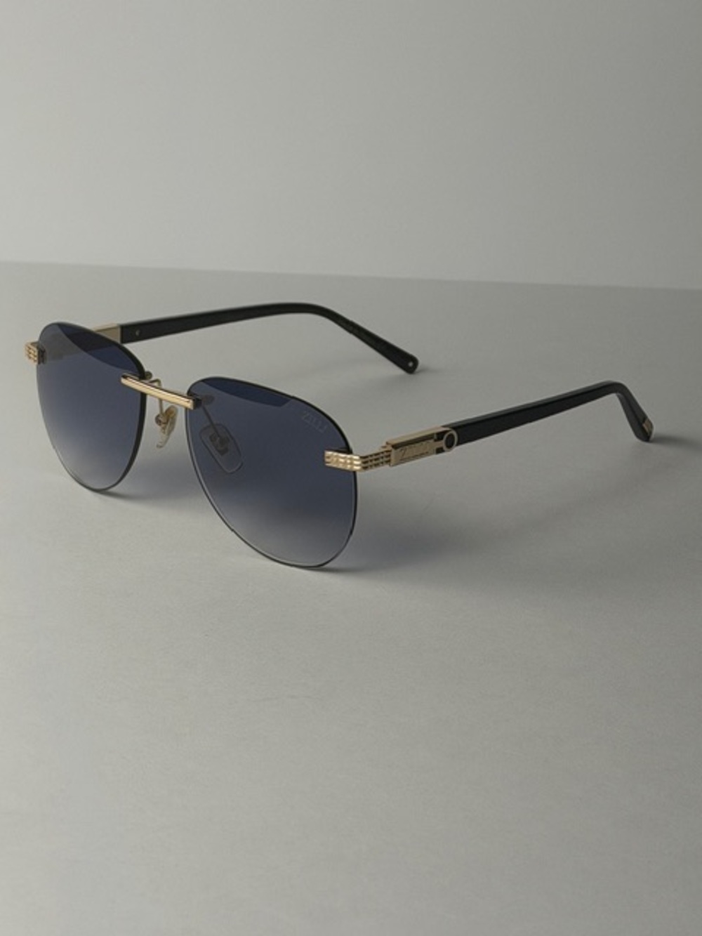 Zilli ZL 65084 C01 Titanium Black and Gold Rimless Sunglasses